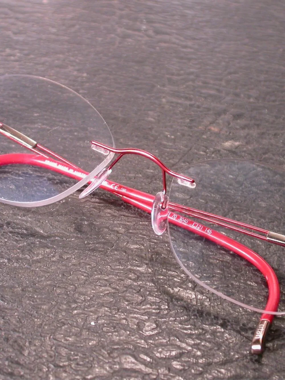 Silhouette Titan Frameless Red Wire Light Weight Eyeglasses Made in Austria